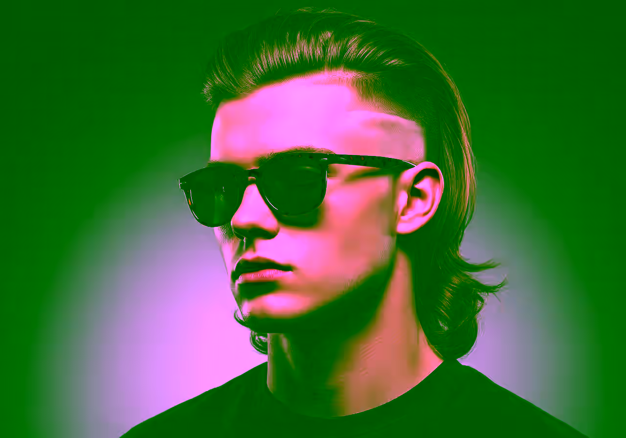 Skin Fade Mullet hairstyle for men 2026 — skin fade variation, best for oval, round faces + wavy/curly hair, modern barbering by Master Stylist Jessica Hamilton