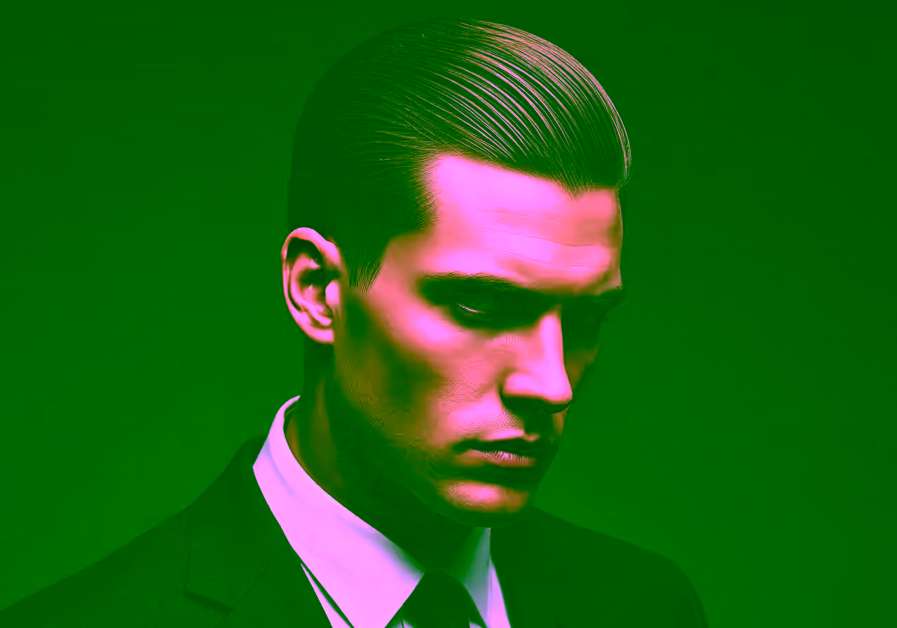Skin Fade Slick Back hairstyle for men 2026 — skin fade variation, best for heart, oval faces + straight hair, modern barbering by Master Stylist Jessica Hamilton