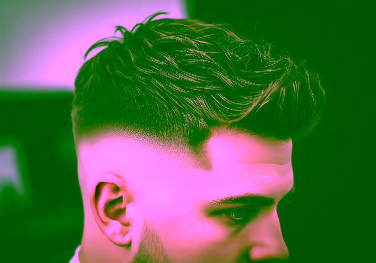 Skin Fade Textured Crop hairstyle for men 2026 — skin fade variation, best for square, diamond faces + wavy hair, modern barbering by Master Stylist Jessica Hamilton
