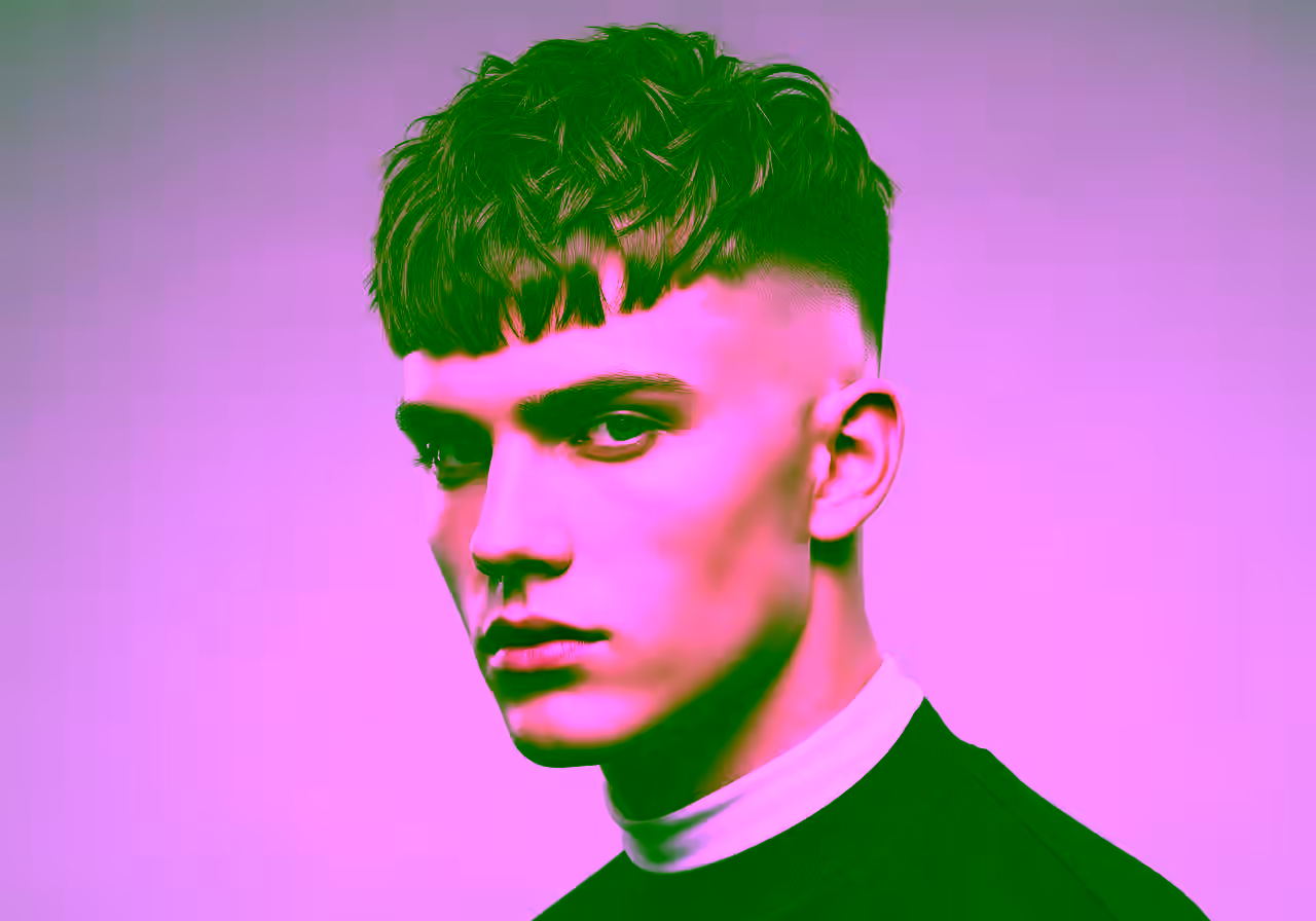 Skin Fade Textured Fringe hairstyle for men 2026 — skin fade variation, best for teens, oval/round faces + straight hair, modern barbering by Master Stylist Jessica Hamilton