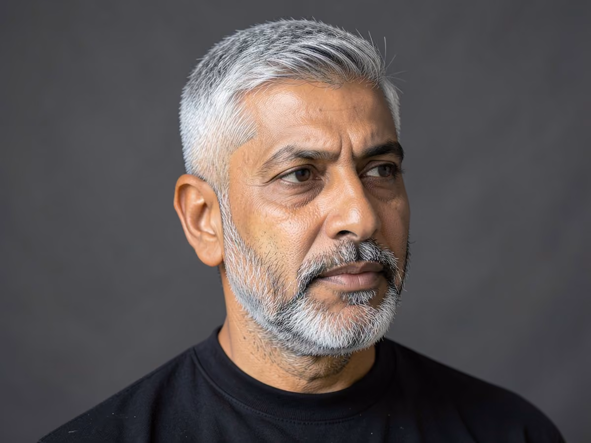 Man with a summer crop with short beard haircut