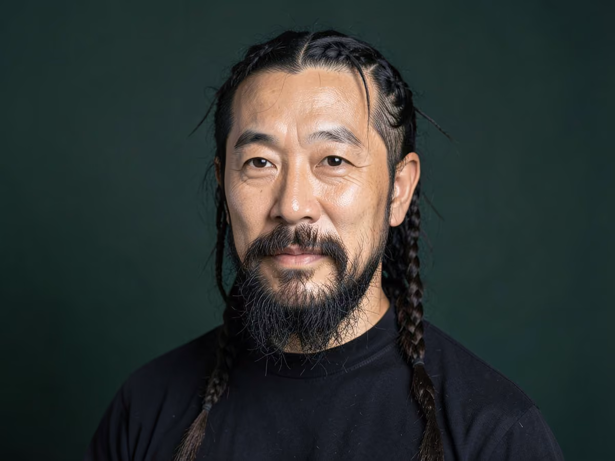 Man with a surfer braids haircut
