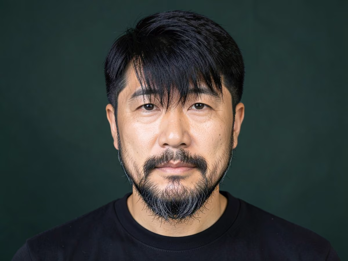 Man with a surfer fringe haircut