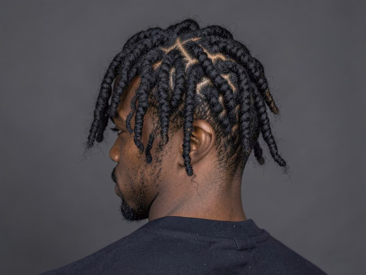 Man with a surfer twists haircut