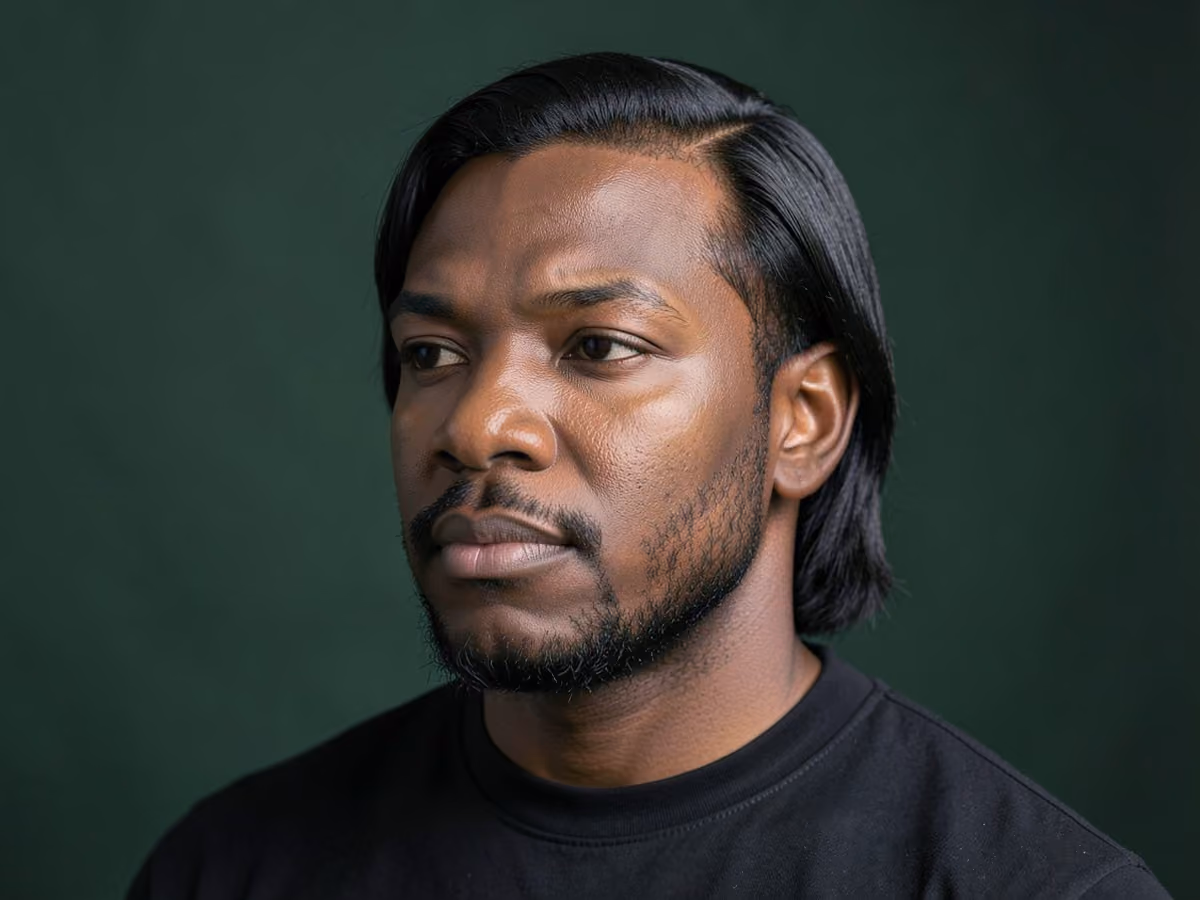 Man with a shoulder length fine hair