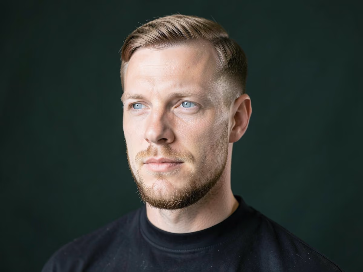 Man with a thin hair chin length cut
