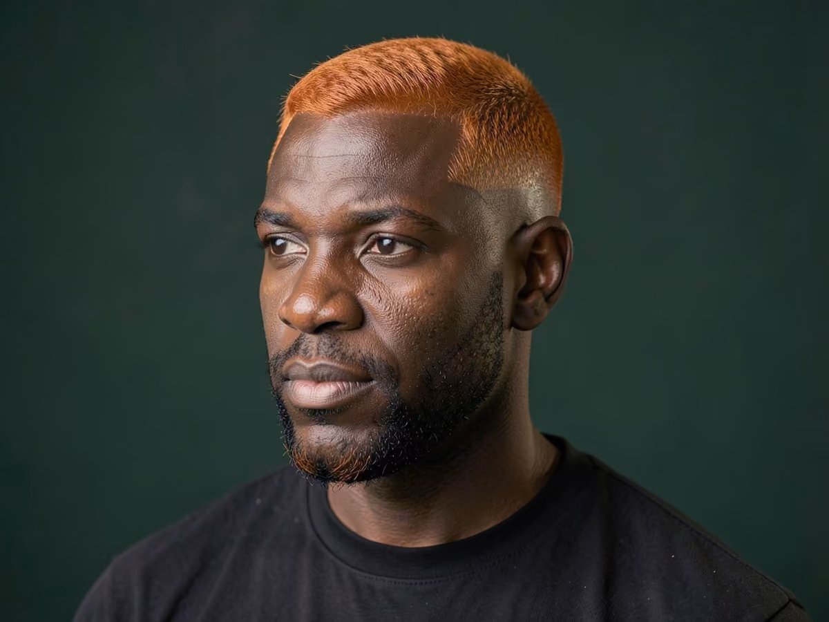Man with a thin red hair haircut