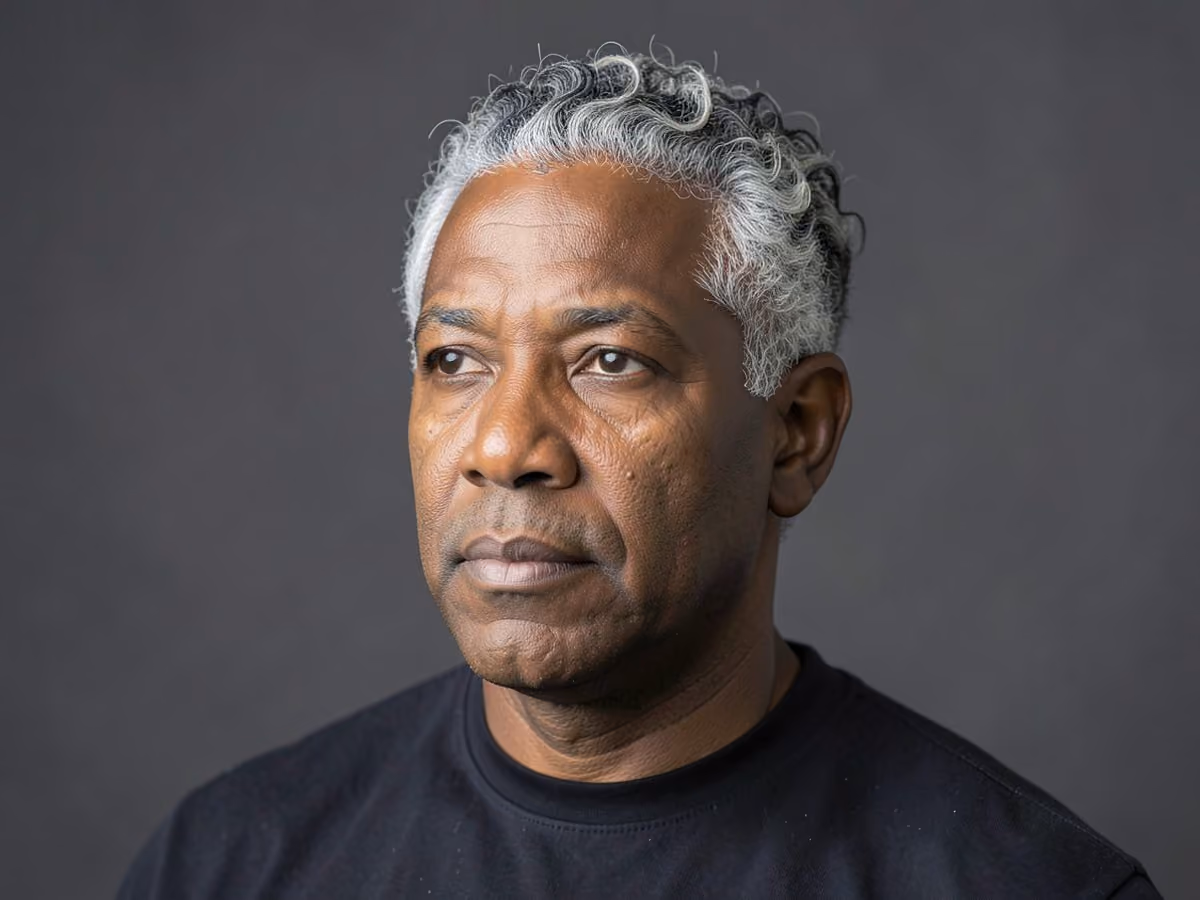 Man with a gray twists haircut