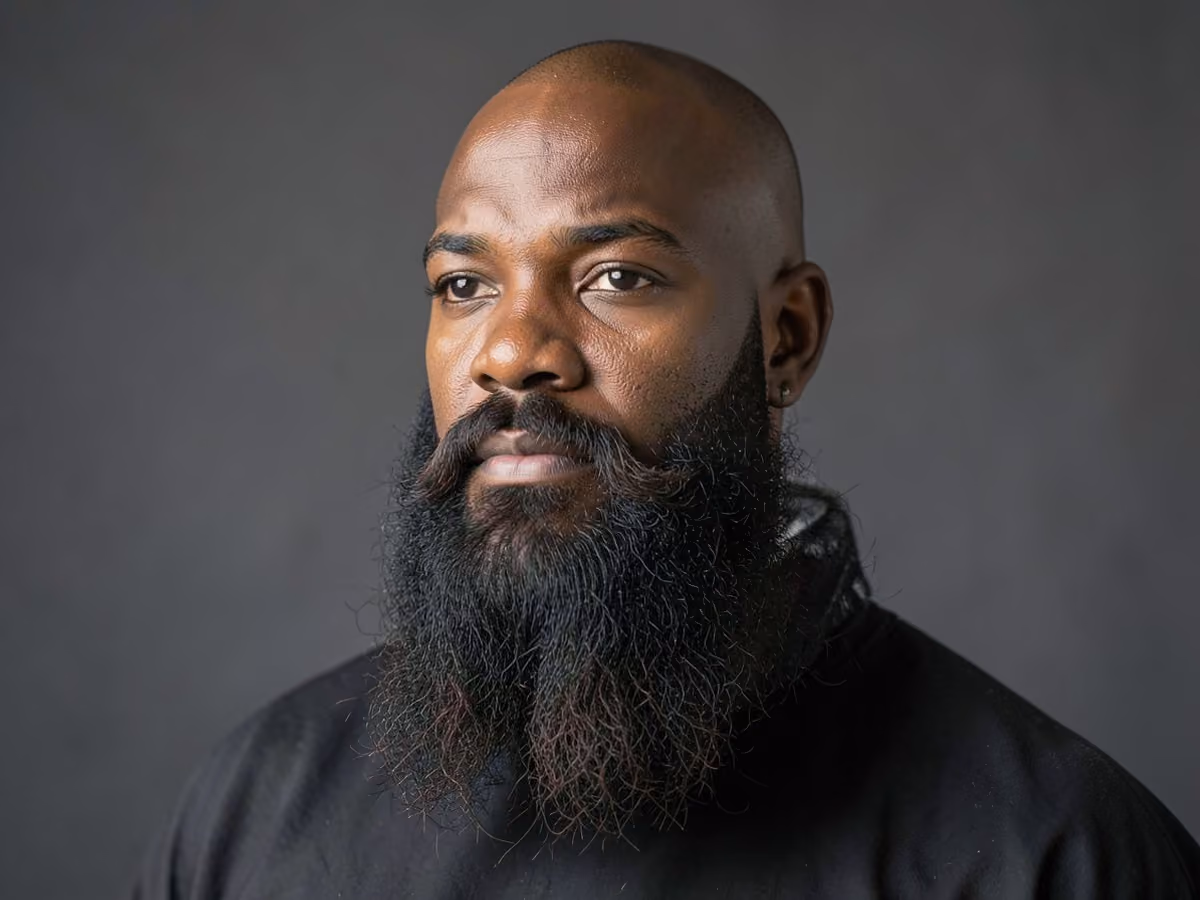 Man with a viking beard with shaved head haircut