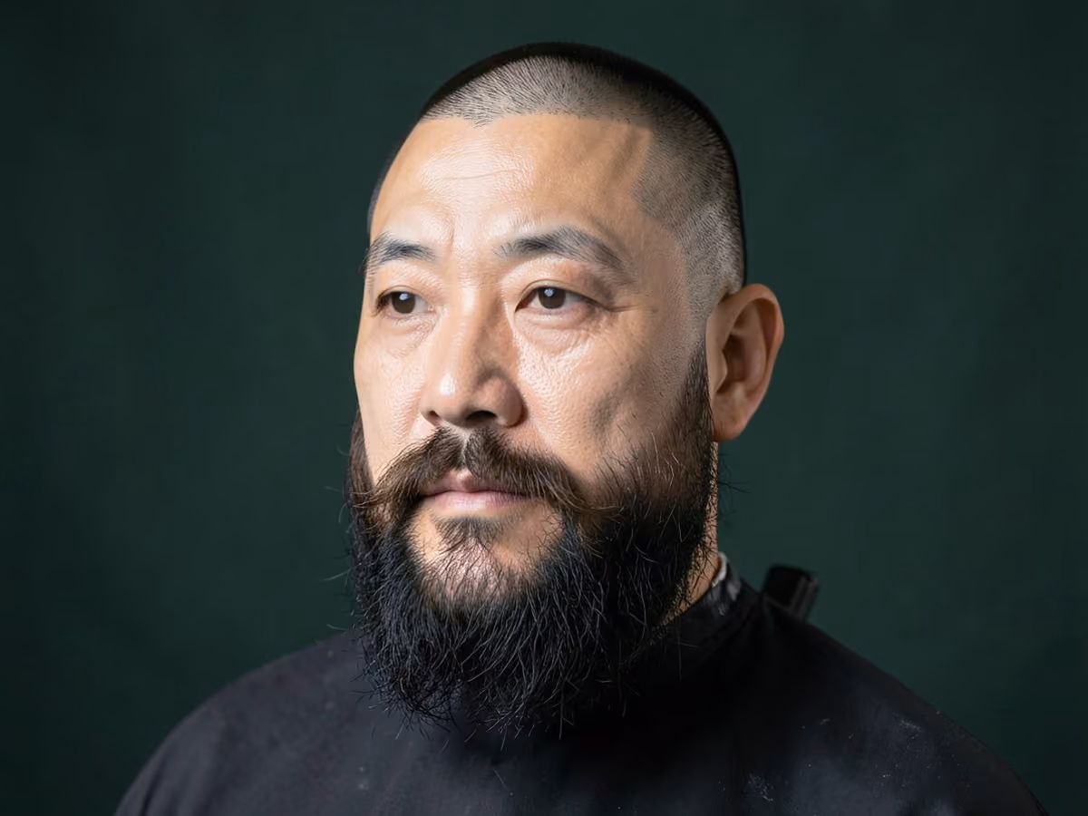 Man with a viking buzz cut with beard