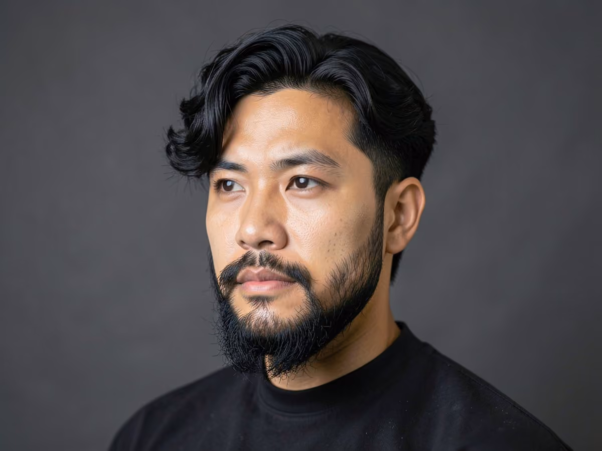 Man with a wavy hair with beard