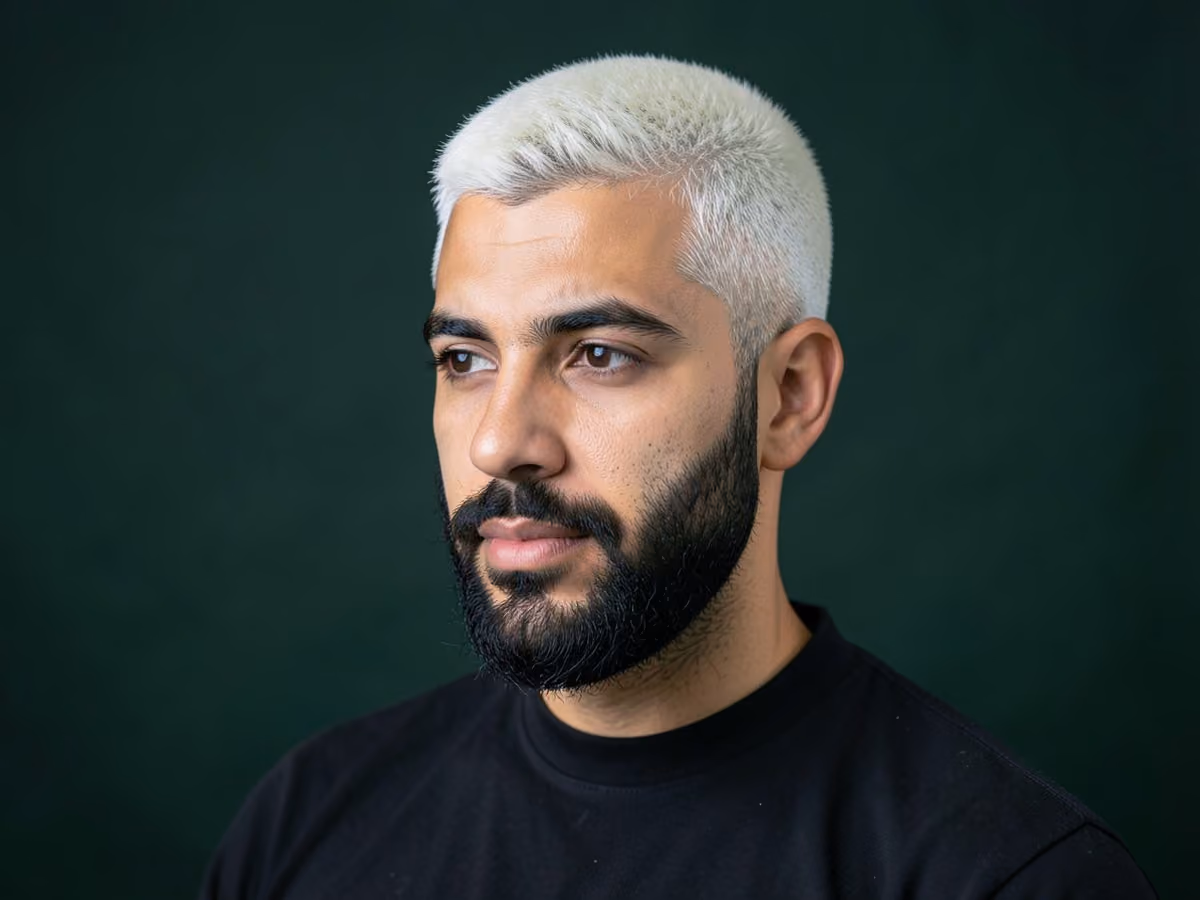 Man with a zac efron platinum blond hair